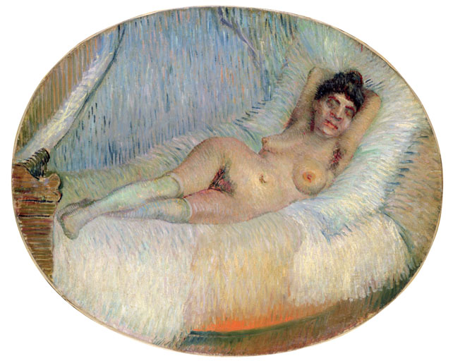 Donna nuda distesa su un letto